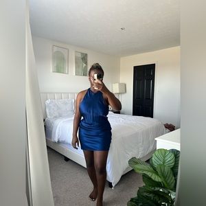 Blue mini backless dress from Zara.